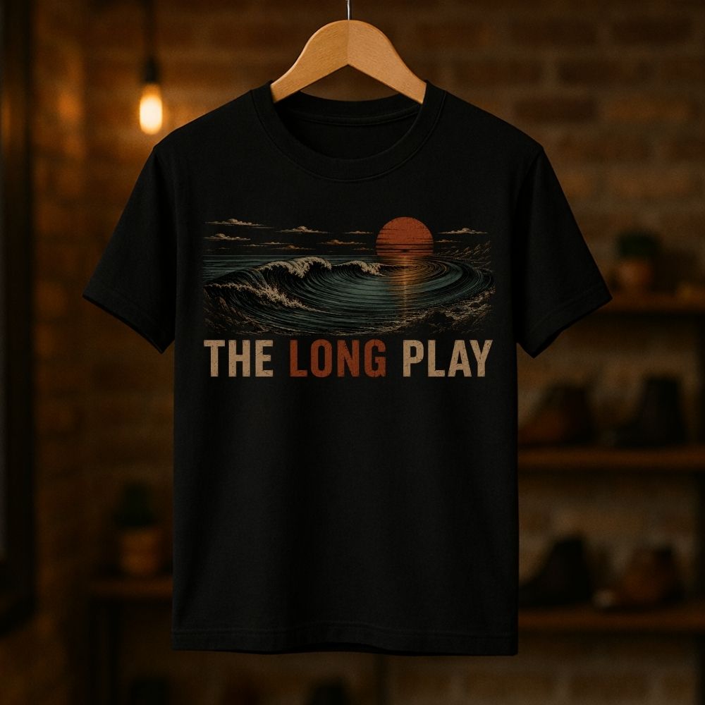 Black t-shirt with 'The Long Play' design on a wooden hanger against a dark background