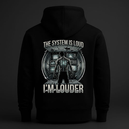 Black hoodie with dystopian sci-fi back graphic reading “The System Is Loud, I’m Louder,” featuring a cybernetic human figure surrounded by CRT screens