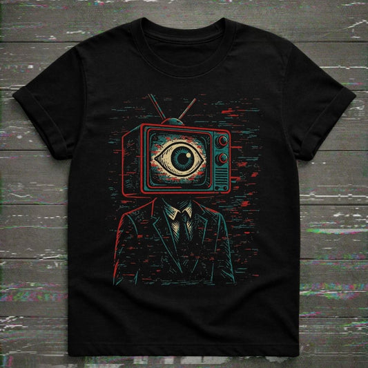 Black t-shirt featuring a vintage CRT television-headed figure with a large eye on the screen surrounded by analog static and glitch textures.