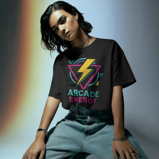 Female model wearing black Arcade Energy T-shirt with vibrant lightning bolt and retro shapes, artistic studio lighting, Twistbug retro fashion