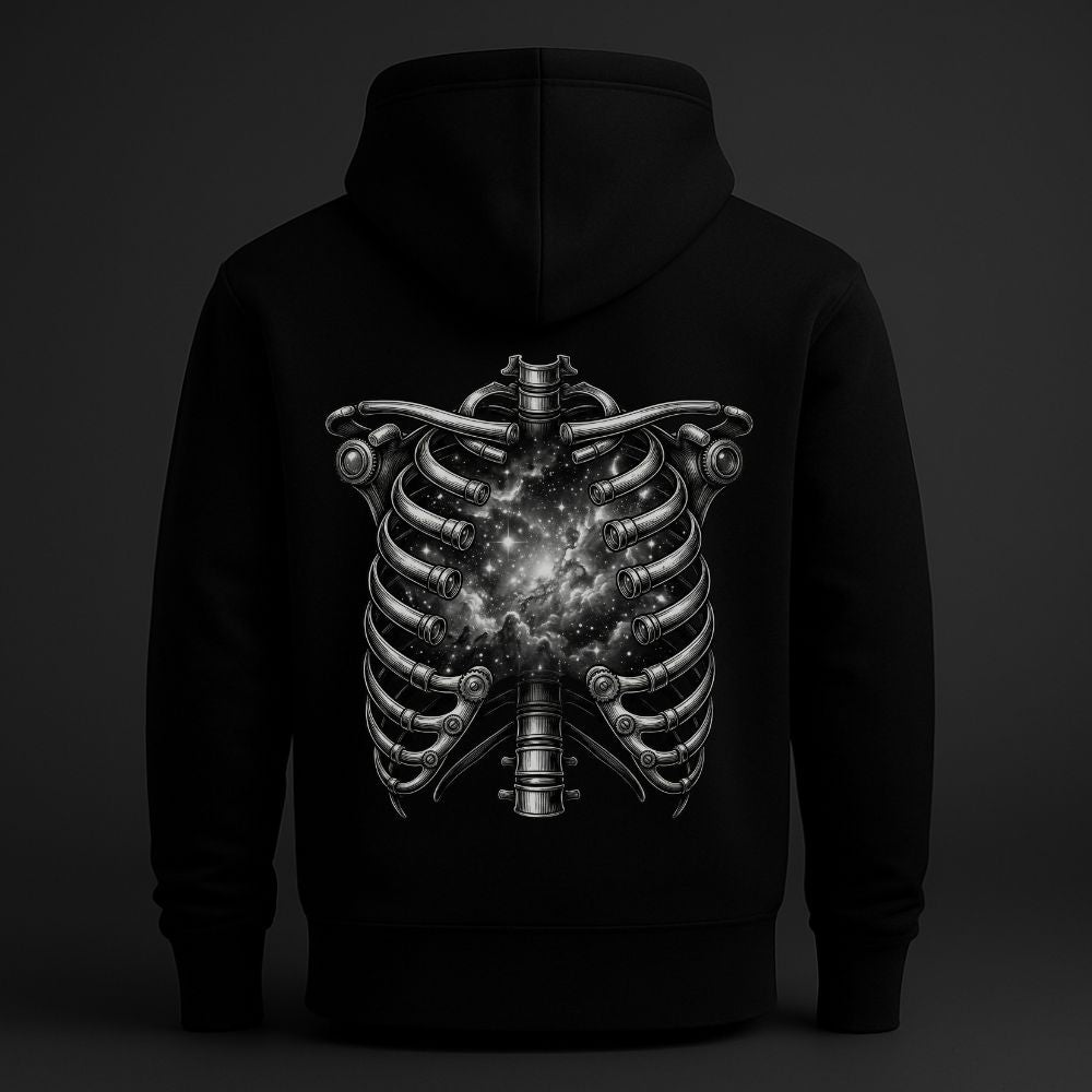 Back view of black hoodie featuring an anatomical ribcage opening into a cosmic galaxy, dark symbolic streetwear design