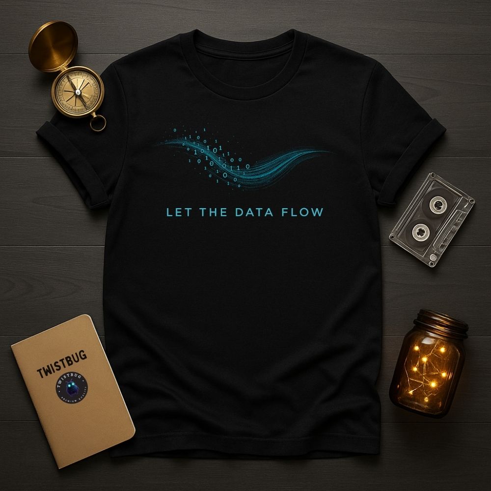 Black tee — Flat lay of black T-shirt with cyan binary wave and text “LET THE DATA FLOW,” on dark wood desk with brass compass, cassette tape, Twistbug notebook, and jar of fairy lights