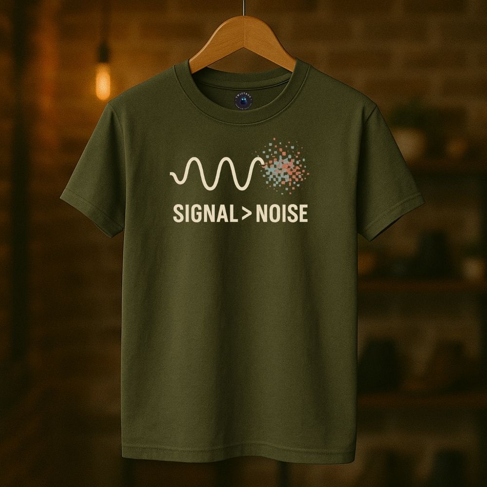 Military green Twistbug t-shirt on hanger with ‘Signal > Noise’ waveform and pixel fade design, boutique setting.