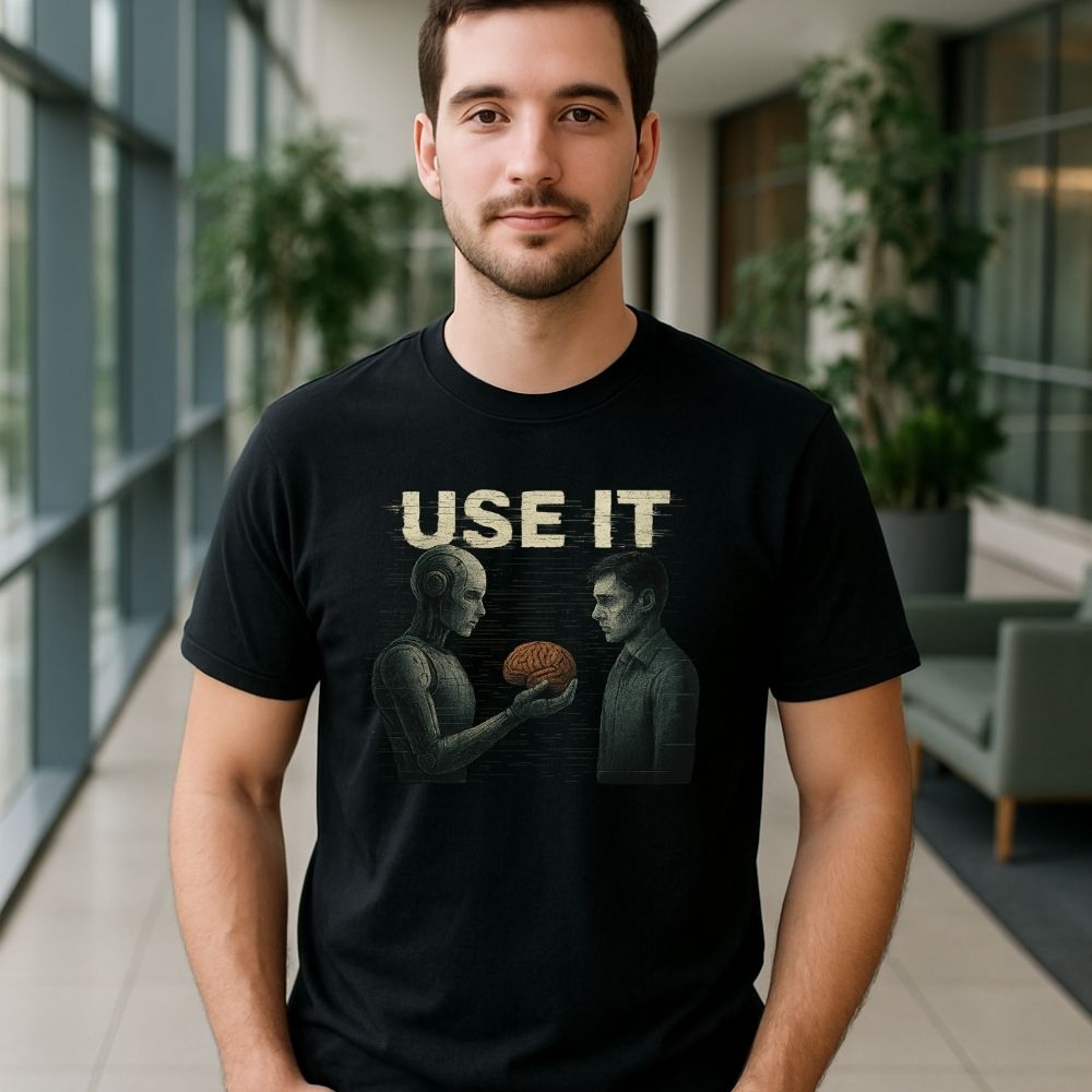 Man wearing Twistbug black t-shirt reading ‘USE IT’ with a robot handing a human brain to a man, bright indoor atrium