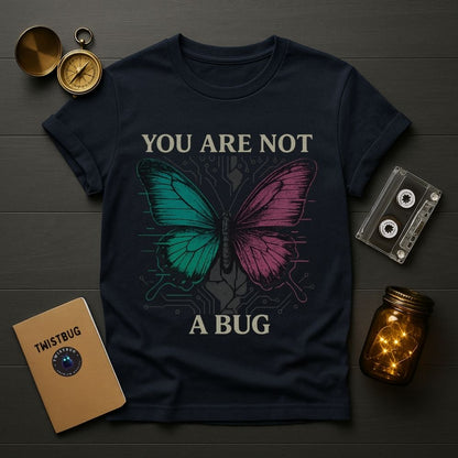 Navy blue Twistbug T-shirt featuring a neon butterfly and you are not a bug slogan, laid flat with cassette and compass
